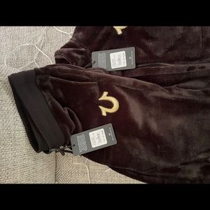 Tru religion new drop black and gold sweatpants.